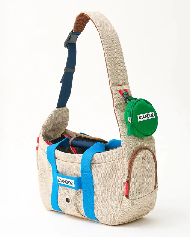 Peek-A-Boo Dog Sling Bag In Cream 1