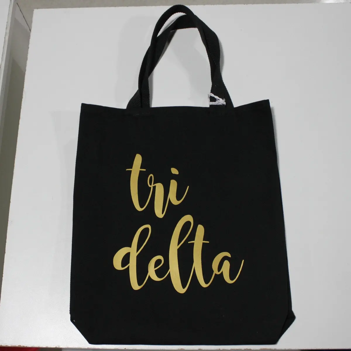 Delta Delta Delta Black Vinyl Tote 1