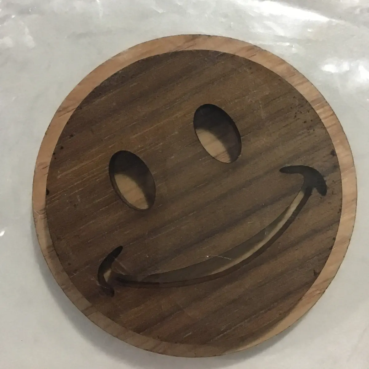 Smiley Face Oak-Backed Symbol 1