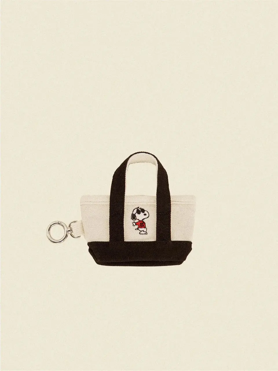 The Little Beast Snoopy Poop Bag Tote In Black Or Red 1